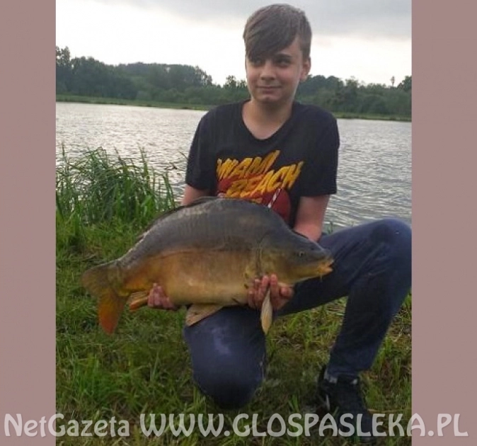 14 – latek z 11 kg karpiem